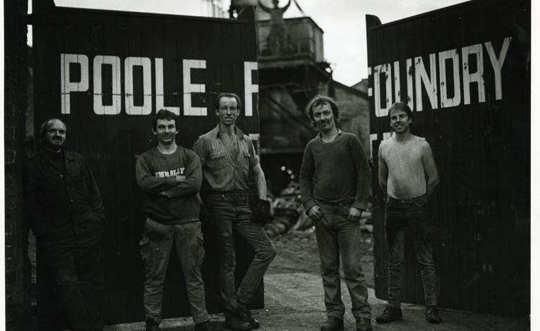 Image shows Poole Foundry workers outside the foundry gates - copyright Gary Norman